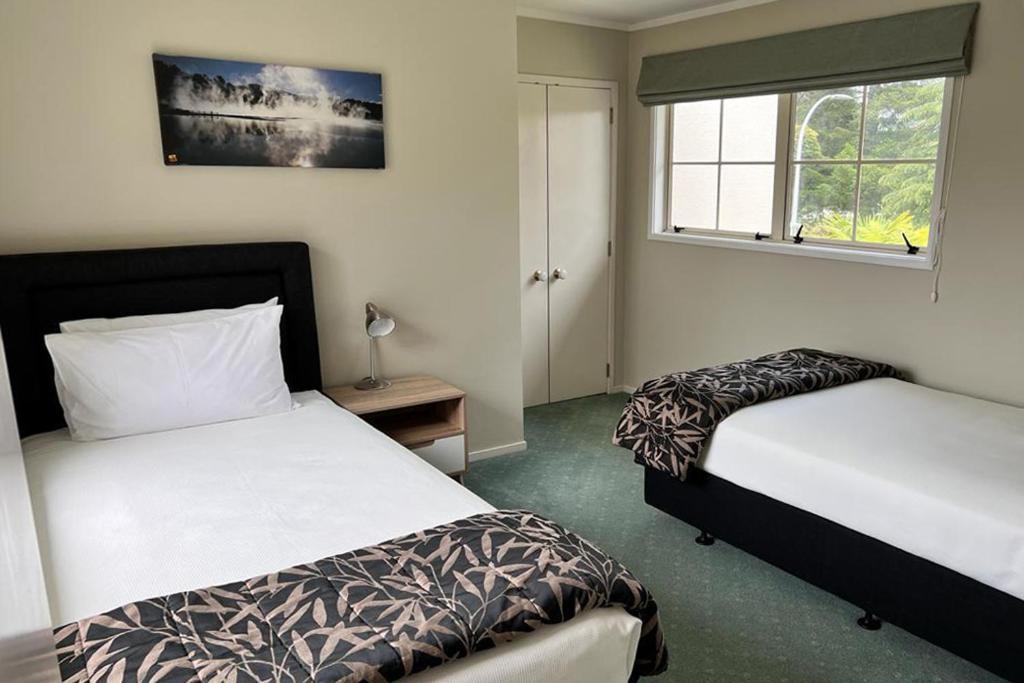 Silver Fern Rotorua Suites & Spa Eksteriør bilde A bedroom at the hotel